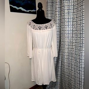 Flowing White Dress with Flower Crochet Detail